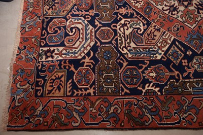 Lot 42 - A vintage Caucasian woollen carpet