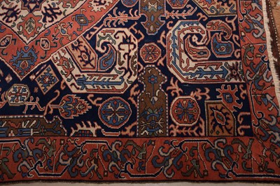 Lot 42 - A vintage Caucasian woollen carpet