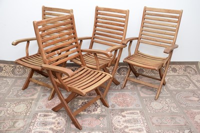 Lot 49 - Four modern teak garden chairs