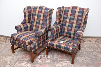 Lot 50 - A pair of c1980s upholstered wing back armchairs