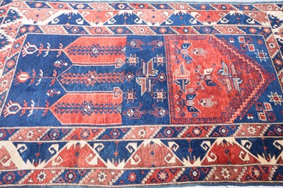 Lot 57 - A vintage Middle Eastern woollen mihrab prayer carpet