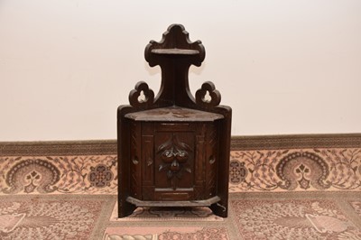 Lot 71 - A second half 19th century Black Forest carved corner wall unit
