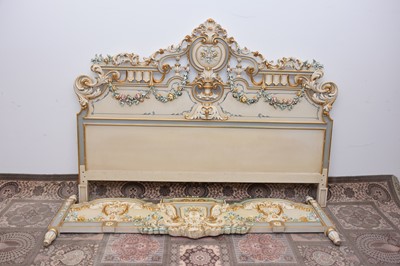 Lot 79 - A modern Spanish ornate bed headboard and footer