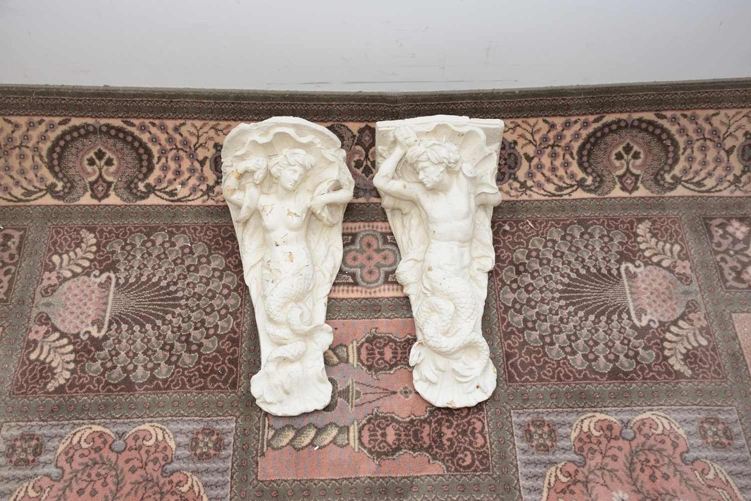 Lot 85 - A pair of plaster wall brackets