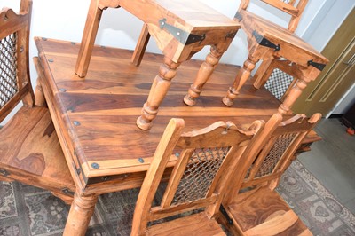 Lot 91 - A modern mango wood and iron dining table and six chairs