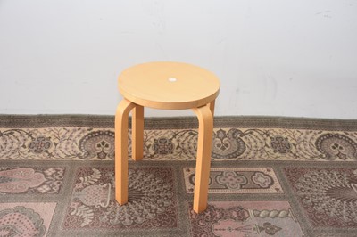 Lot 92 - A modern Artek beech stool designed by Alvar Aalto
