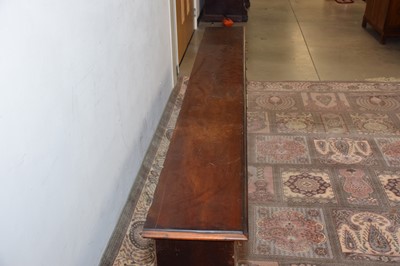 Lot 99 - A Victorian period mahogany apothecary drawer unit, 246cm wide and 64cm high, with multiple drawers, most with glass applied sign and glass knobs, AF