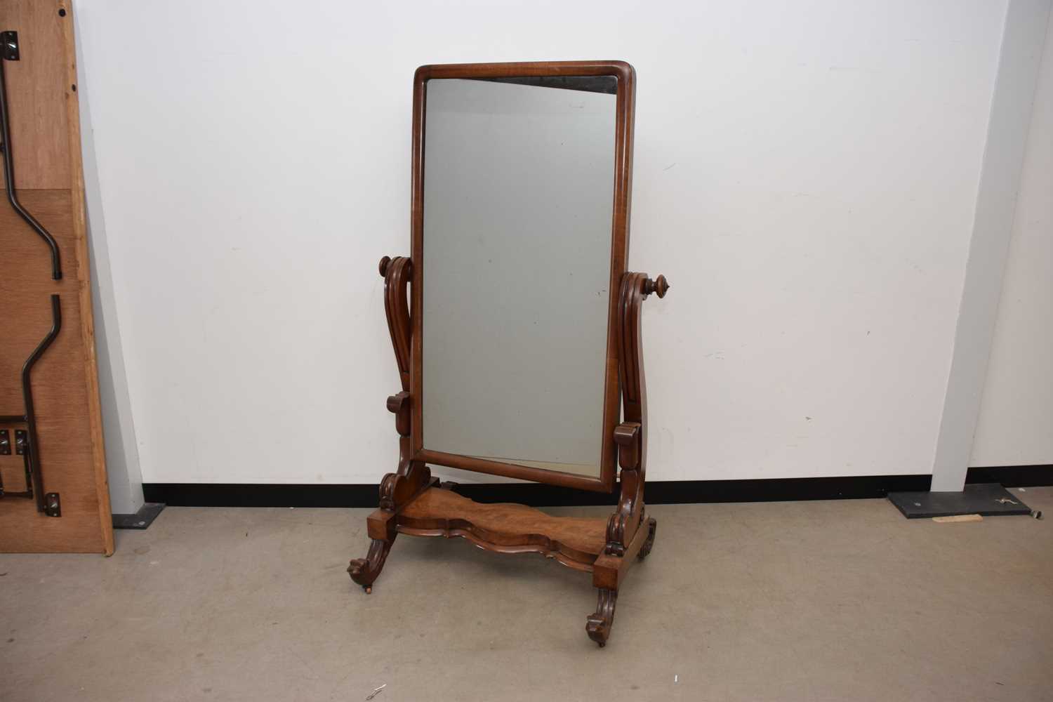 Lot 102 - A Victorian mahogany cheval mirror