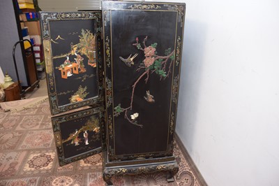 Lot 103 - A late 19th or early 20th century Japanese black lacquer and inlaid cabinet on stand