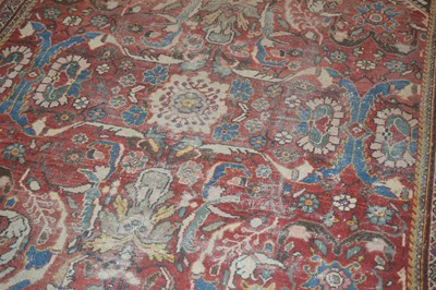 Lot 117 - A large antique hand-knotted wool Heriz carpet