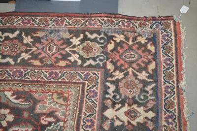 Lot 117 - A large antique hand-knotted wool Heriz carpet