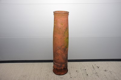 Lot 142 - A tall terracotta vintage chimney pot