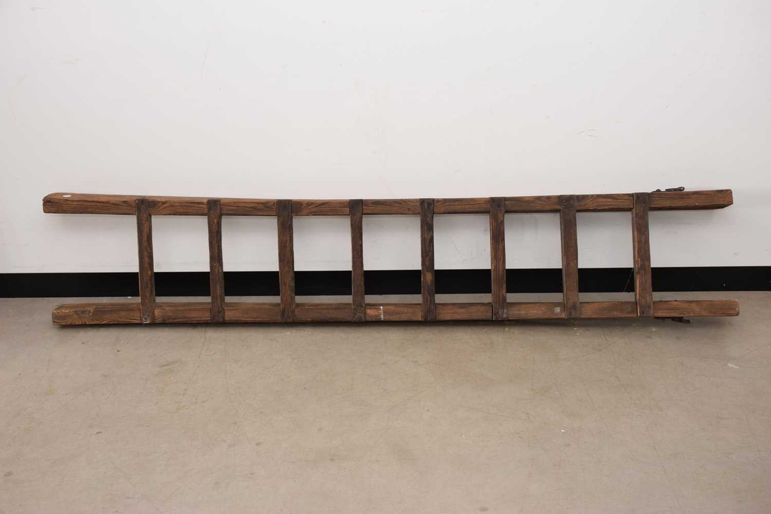 Lot 145 - A damaged antique cottage ladder