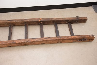 Lot 145 - A damaged antique cottage ladder