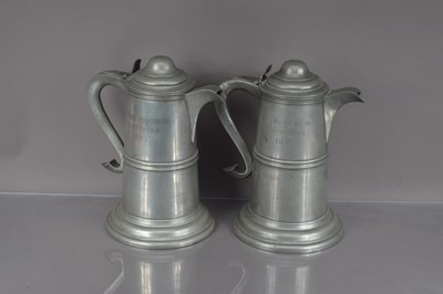 Lot 150 - A pair of early Victorian pewter church related Communion Flagons