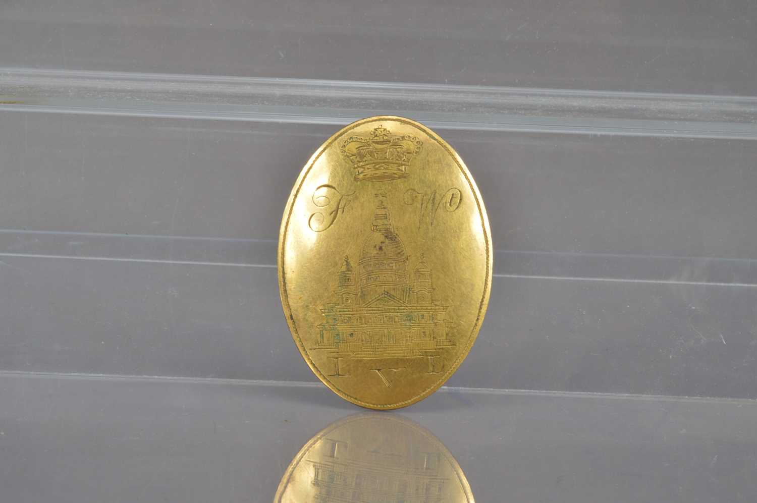 Lot 155 - An interesting George III period Napoleonic era gilt brass shoulder plate badge