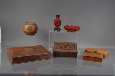 Lot 165 - A group of five hardwood boxes and two cinnabar lacquer items
