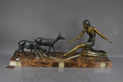 Lot 167 - An Art Deco bronzed and marble figural group after Uriano