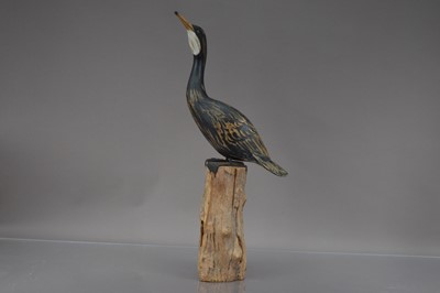 Lot 170 - A modern wooden sculpture of a bird