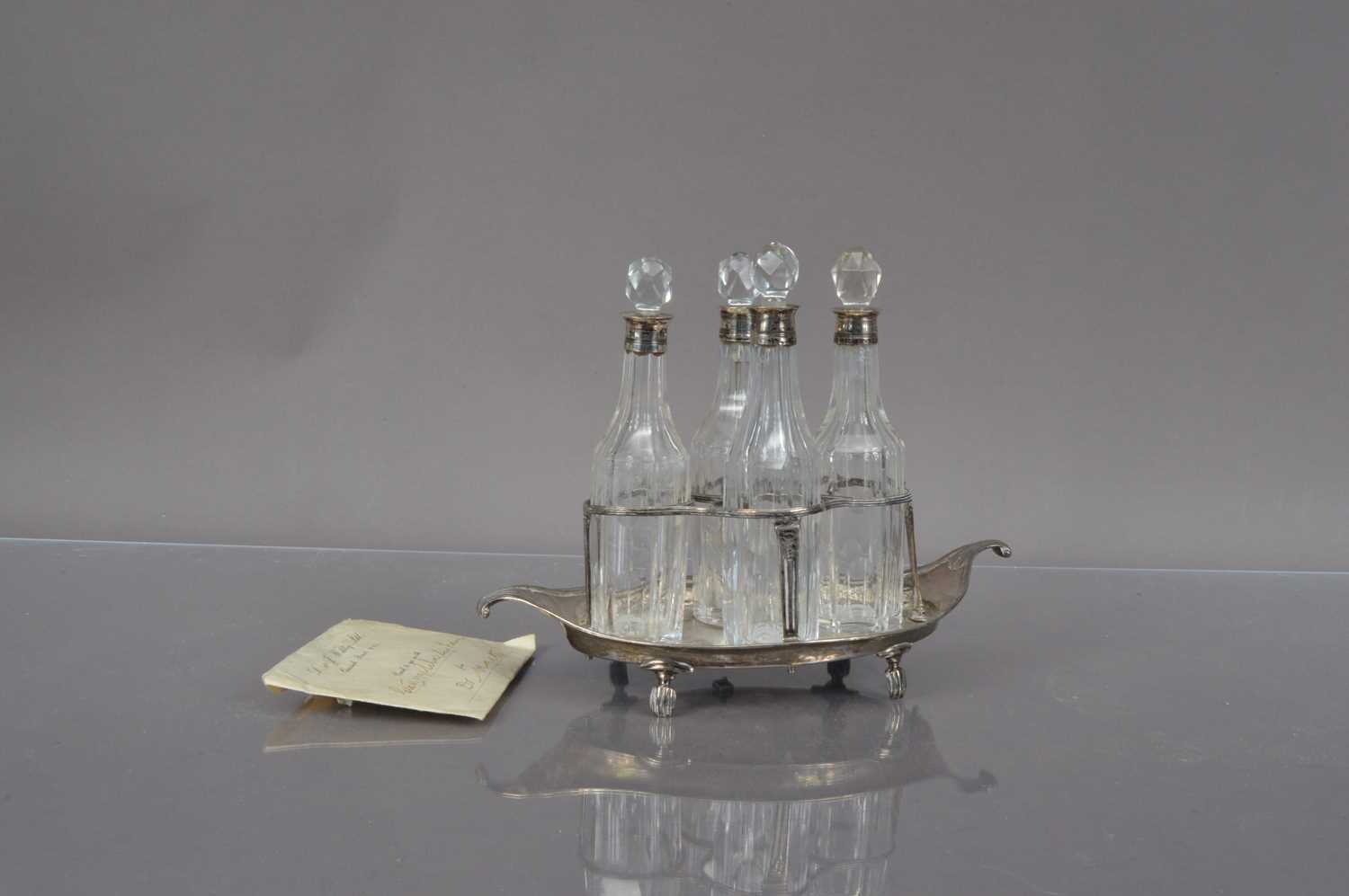 Lot 181 - A Georgian silver cruet stand