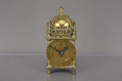 Lot 187 - A c1950s brass lantern clock by Smiths
