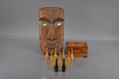 Lot 193 - A 19th Century New Zealand woods treen box and a later vintage carved Koruru Mask