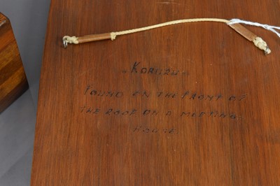 Lot 193 - A 19th Century New Zealand woods treen box and a later vintage carved Koruru Mask