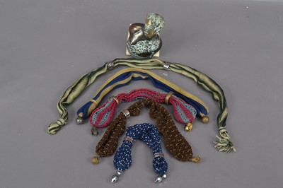 Lot 204 - A collection of 19th Century miser's purses and a brass fitting