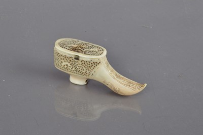 Lot 207 - A mid-18th Century Russian carved marine ivory miniature shoe