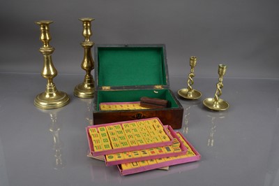 Lot 228 - A Victorian mahogany workbox containing a 20th Century Mahjong set, together with two pairs of brass candlesticks