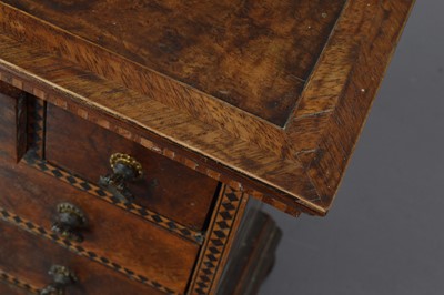 Lot 249 - An antique miniature walnut wood apprentice piece or doll's house chest of drawers