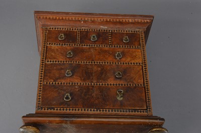 Lot 249 - An antique miniature walnut wood apprentice piece or doll's house chest of drawers
