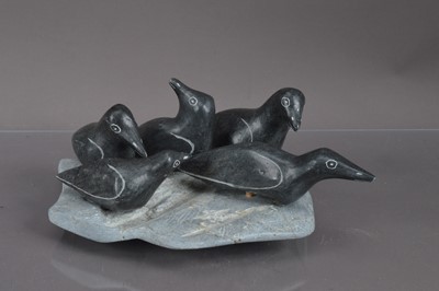 Lot 257 - An Inuit carved stone sculpture group of five artic seabirds