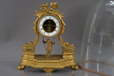 Lot 259 - A French late 19th Century gilt bronze ormolu cherub swing pendulum mantel clock