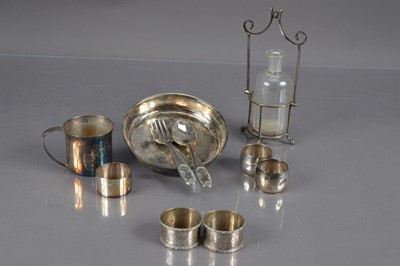 Lot 265 - A pair of sterling silver napkin rings, Birmingham 1906