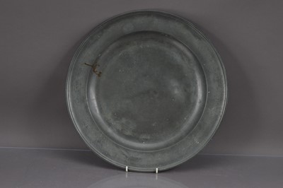 Lot 266 - A large 18th Century pewter charger