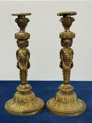 Lot 292 - A good pair of French Louis XVI style ormolu gilt bronze candlesticks