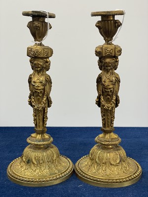 Lot 292 - A good pair of French Louis XVI style ormolu gilt bronze candlesticks