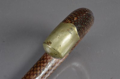 Lot 294 - An unusual snakeskin leather covered walking stick