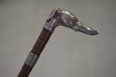 Lot 295 - An early cinema associated fine antique English silver mounted whippet or greyhound head walking cane