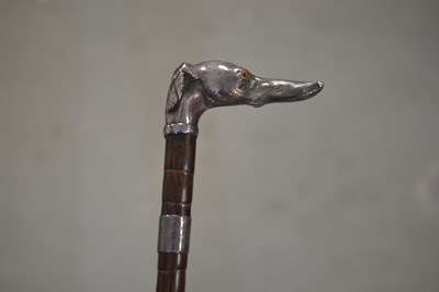 Lot 295 - An early cinema associated fine antique English silver mounted whippet or greyhound head walking cane