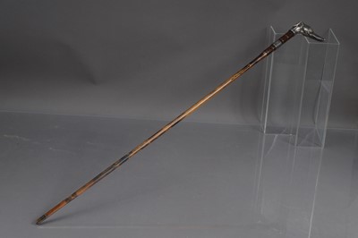 Lot 295 - An early cinema associated fine antique English silver mounted whippet or greyhound head walking cane