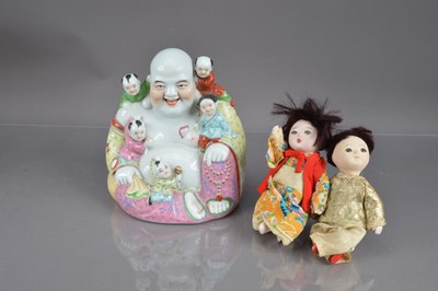 Lot 310 - A Chinese famille rose porcelain laughing buddha