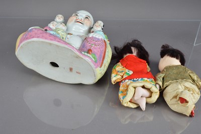 Lot 310 - A Chinese famille rose porcelain laughing buddha