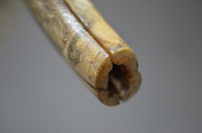 Lot 316 - A Japanese carved boar's tusk