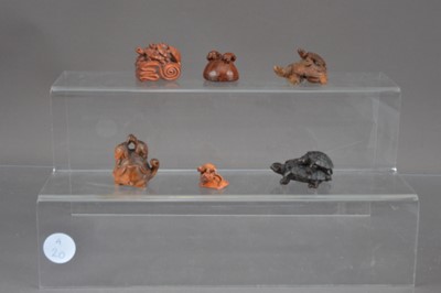 Lot 317 - Six Japanese wooden netsuke carved as turtles