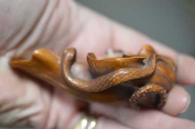 Lot 320 - A Japanese boxwood carving of a lotus leaf