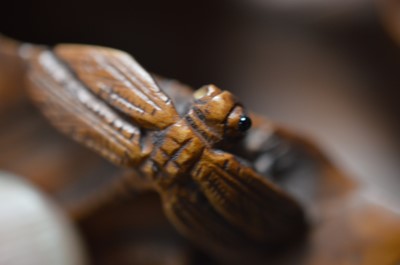 Lot 320 - A Japanese boxwood carving of a lotus leaf