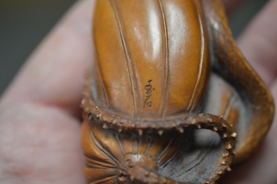 Lot 320 - A Japanese boxwood carving of a lotus leaf