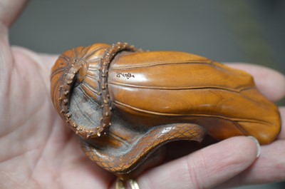 Lot 320 - A Japanese boxwood carving of a lotus leaf